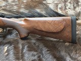 NEW WINCHESTER MODEL 70 SUPER GRADE 300 WIN MAG 26