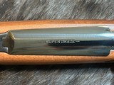 NEW WINCHESTER MODEL 70 SUPER GRADE 300 WIN MAG 26