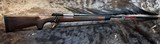 NEW WINCHESTER MODEL 70 SUPER GRADE 300 WIN MAG 26