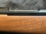 NEW WINCHESTER MODEL 70 SUPER GRADE 300 WIN MAG 26