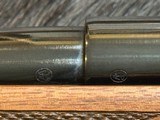 NEW WINCHESTER MODEL 70 SUPER GRADE 300 WIN MAG 26