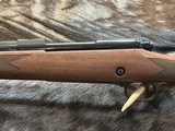 NEW WINCHESTER MODEL 70 SUPER GRADE 300 WIN MAG 26 NEW WINCHESTER MODEL 70 SUPER GRADE 300 WIN MAG 26