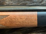 NEW WINCHESTER MODEL 70 SUPER GRADE 338 WIN MAG 26