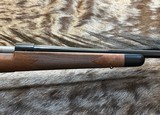 NEW WINCHESTER MODEL 70 SUPER GRADE 338 WIN MAG 26