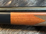 NEW WINCHESTER MODEL 70 SUPER GRADE 338 WIN MAG 26
