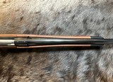 NEW WINCHESTER MODEL 70 SUPER GRADE 338 WIN MAG 26