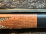 NEW WINCHESTER MODEL 70 SUPER GRADE 338 WIN MAG 26