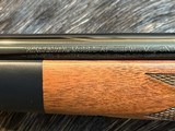 NEW WINCHESTER MODEL 70 SUPER GRADE 338 WIN MAG 26