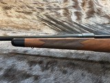 NEW WINCHESTER MODEL 70 SUPER GRADE 338 WIN MAG 26