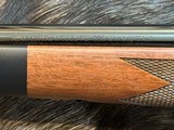 NEW WINCHESTER MODEL 70 SUPER GRADE 338 WIN MAG 26