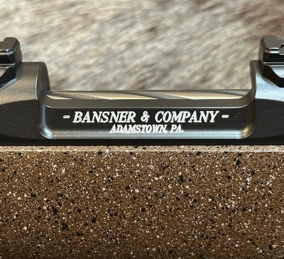 THE FUSION - JD OUTFITTERS' EXCLUSIVE - 1 OF 5 LIMITED EDITION BANSNER CUSTOM 6.5 PRC MODEL 704, CARBON STOCK, 24