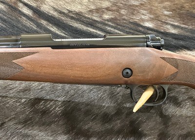 NEW WINCHESTER MODEL 70 SUPER GRADE 6.5 PRC 24