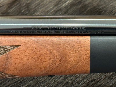 NEW WINCHESTER MODEL 70 SUPER GRADE 6.5 PRC 24