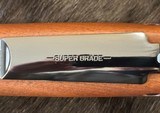 NEW WINCHESTER MODEL 70 SUPER GRADE 6.5 PRC 24