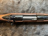 NEW WINCHESTER MODEL 70 SUPER GRADE 300 WIN MAG 26