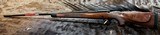 NEW WINCHESTER MODEL 70 SUPER GRADE 300 WIN MAG 26