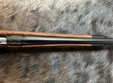 NEW WINCHESTER MODEL 70 SUPER GRADE 300 WIN MAG 26