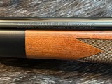 NEW WINCHESTER MODEL 70 SUPER GRADE 300 WIN MAG 26
