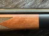 NEW WINCHESTER MODEL 70 SUPER GRADE 300 WIN MAG 26
