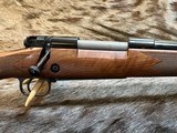 NEW WINCHESTER MODEL 70 SUPER GRADE 300 WIN MAG 26