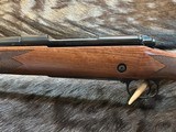 NEW WINCHESTER MODEL 70 SUPER GRADE 300 WIN MAG 26