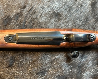 NEW WINCHESTER MODEL 70 SUPER GRADE 300 WIN MAG 26