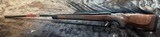 NEW WINCHESTER MODEL 70 SUPER GRADE 300 WIN MAG 26