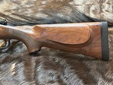 NEW WINCHESTER MODEL 70 SUPER GRADE 300 WIN MAG 26