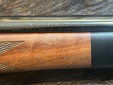 NEW WINCHESTER MODEL 70 SUPER GRADE 300 WIN MAG 26