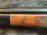 NEW WINCHESTER MODEL 70 SUPER GRADE 300 WIN MAG 26