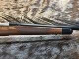 NEW WINCHESTER MODEL 70 SUPER GRADE 300 WIN MAG 26
