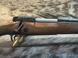 NEW WINCHESTER MODEL 70 SUPER GRADE 300 WIN MAG 26
