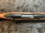 NEW WINCHESTER MODEL 70 SUPER GRADE 300 WIN MAG 26