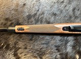 NEW WINCHESTER MODEL 70 SUPER GRADE 300 WIN MAG 26