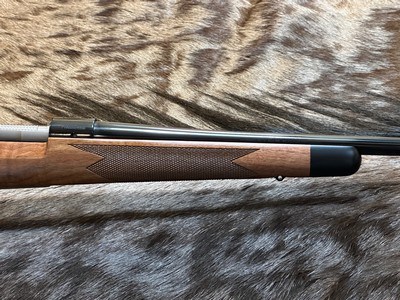 NEW WINCHESTER MODEL 70 SUPER GRADE 300 WIN MAG 26