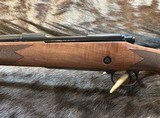 NEW WINCHESTER MODEL 70 SUPER GRADE 300 WIN MAG 26