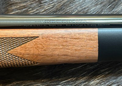 NEW WINCHESTER MODEL 70 SUPER GRADE 300 WIN MAG 26