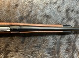 NEW WINCHESTER MODEL 70 SUPER GRADE 300 WIN MAG 26
