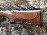 NEW WINCHESTER MODEL 70 SUPER GRADE 300 WIN MAG 26