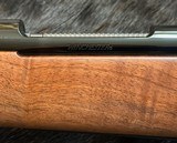NEW WINCHESTER MODEL 70 SUPER GRADE 300 WIN MAG 26