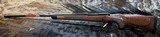 NEW WINCHESTER MODEL 70 SUPER GRADE 300 WIN MAG 26