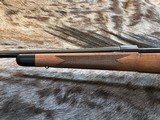 NEW WINCHESTER MODEL 70 SUPER GRADE 300 WIN MAG 26