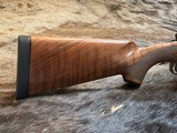 NEW WINCHESTER MODEL 70 SUPER GRADE 300 WIN MAG 26