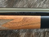 NEW WINCHESTER MODEL 70 SUPER GRADE 300 WIN MAG 26