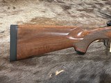NEW WINCHESTER MODEL 70 SUPER GRADE 300 WIN MAG 26