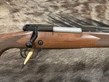 NEW WINCHESTER MODEL 70 SUPER GRADE 300 WIN MAG 26