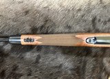 NEW WINCHESTER MODEL 70 SUPER GRADE 300 WIN MAG 26