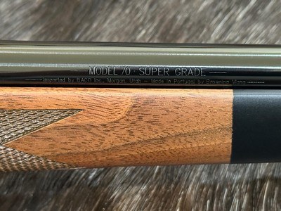 NEW WINCHESTER MODEL 70 SUPER GRADE 300 WIN MAG 26