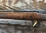 NEW WINCHESTER MODEL 70 SUPER GRADE 338 WIN MAG 26