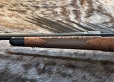 NEW WINCHESTER MODEL 70 SUPER GRADE 338 WIN MAG 26